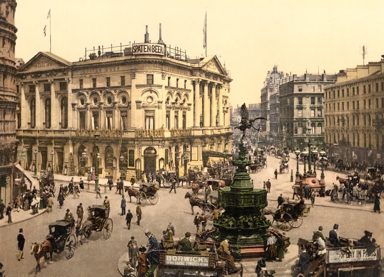 Omnibuses and cabs around the fountain at Piccadilly Circus, London, in the 1890s