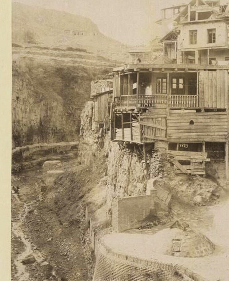 Wooden balconied houses on the edge of the ravine at Abanotubani, Tiflis, in the 1880s